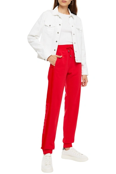Cecilie Copenhagen Ramone Flocked French Cotton-terry Track Trousers In Red