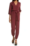 Fraiche By J Tie Waist Long Sleeve Jumpsuit In Wine