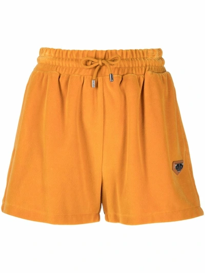Philipp Plein Velvet-effect Logo-plaque Track Shorts In Orange