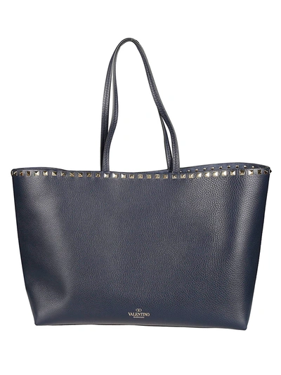 Valentino Garavani Pyramid Studded Shopper Bag In Blu