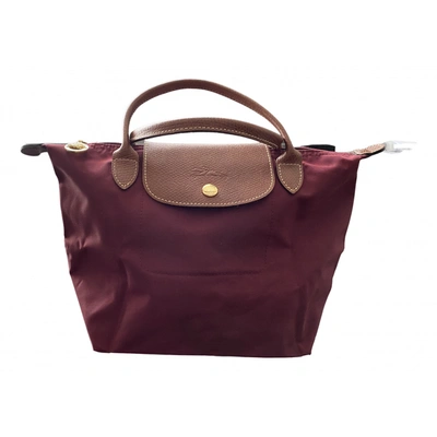 Pre-owned Longchamp Pliage Handbag In Burgundy