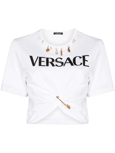 Versace Charm Detail Logo Safety Pin Crop Graphic Tee In White,black,gold
