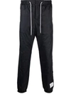 Thom Browne Logo Patch Track Pants In Blau