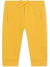 Dolce & Gabbana Logo-embossed Track Pants In Yellow