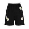 Natasha Zinko Daisy-print Distressed Cotton-blend Shorts In Black