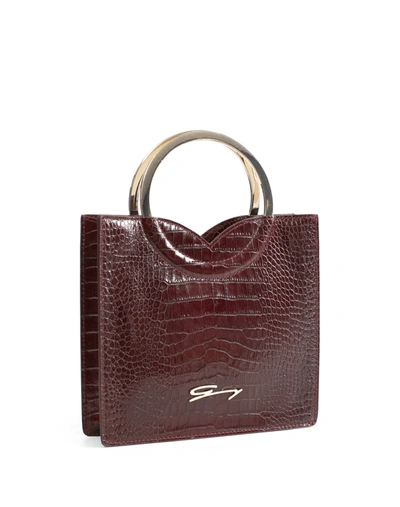 Genny Small Square Burgundy Leather Bag With Round Metal Handles In Red