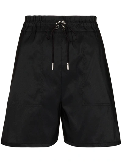 Alexander Mcqueen Loose-fit Mid-rise Shell Shorts In Black