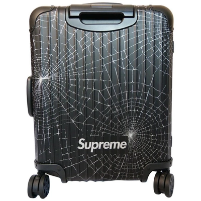 Rimowa X Supreme 55 Suitcase In Grey