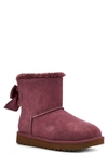 Ugg Mini Bailey Bow Glimmer Faux Fur Lined Boot In Wild Grape