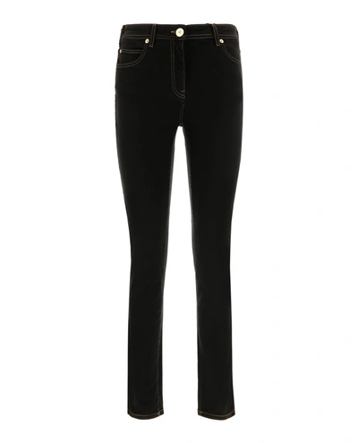 Versace Women Logo Embroidered Skinny Jeans In Black