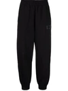 Mcq By Alexander Mcqueen Woman Black Slim Fit Joggers With Logo In Nero