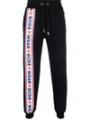 Gcds Jogging Pants With Cute Tape Logo Band In Schwarz