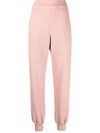 Alexander Mcqueen Logo Print Ribbed Track Pants In Pink