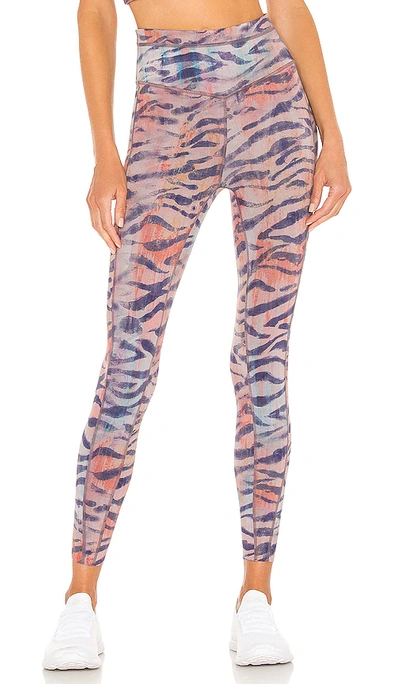 Free People X Fp Movement Beat The Heat Reversible Legging In Tiger Boysenberry Combo