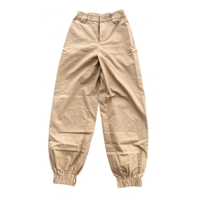 Pre-owned I.am.gia Trousers In Beige