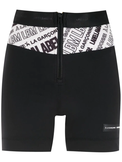 À La Garçonne X Labellamafia Logo Print Zip-up Shorts In Black