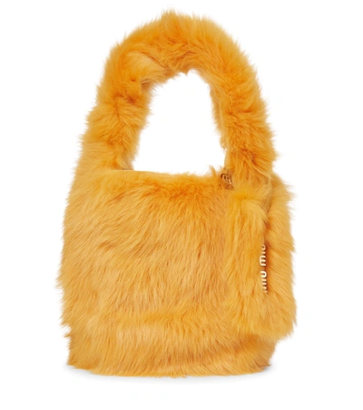 Miu Miu Shearling Shoulder Bag In Orange