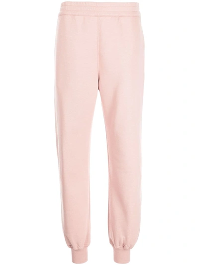 Alexander Mcqueen Logo Print Ribbed Track Pants In Pink
