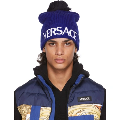 Versace Logo-print Knitted Beanie In Blue