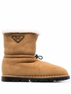 Prada Shearling Drawstring Boots In Nude