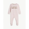GUCCI PALE PINK VINTAGE LOGO-PRINT FOOTED COTTON BABY GROW 0-24 MONTHS 18-24 MONTHS