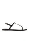 Saint Laurent Black Cassandra Flat Sandals In Crocodile-embossed Leather With Gold-tone Monogram In Nero