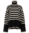 Totême Striped Wool And Cotton Turtleneck Sweater In Black Stripe