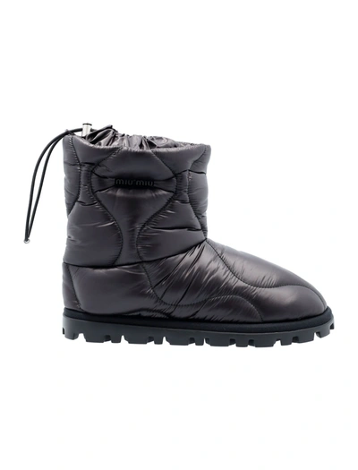 Miu Miu Quilted Padded Boots In Black