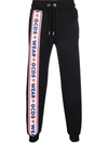 Gcds Jogging Pants With Cute Tape Logo Band In Schwarz