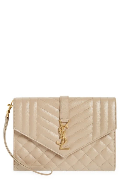 Saint Laurent Monogram Matelasse Leather Clutch In Beige