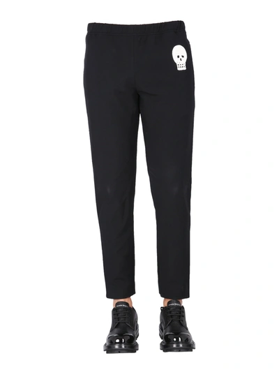 ALEXANDER MCQUEEN JOGGING PANTS WITH EMBROIDERED SKULL,208127