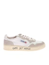 AUTRY CRACKLE EFFECT SNEAKERS IN WHITE