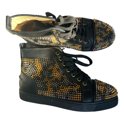 Pre-owned Christian Louboutin Lou Spikes Leather Trainers In Black