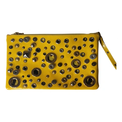 Pre-owned Dolce & Gabbana Patent Leather Clutch Bag In Yellow