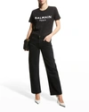 Balmain Black Crewneck T-shirt With Logo Print And Golden Buttons In Jersey Woman In Black/white