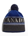 Canada Goose Logo Toque Beanie Hat W/ Pompom In Northern Night
