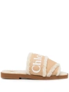 Chloé Woody Shearling-trimmed Logo-print Canvas Slides In Neutrals