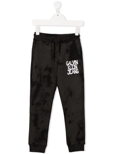 Calvin Klein Tie-dye Logo-print Track Pants In Black