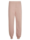 Alexander Mcqueen Logo Print Ribbed Track Pants In Rose Gold