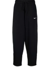Nike Embroidered Cotton-blend Fleece Track Pants In Black