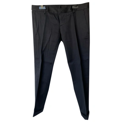 Pre-owned Dsquared2 Wool Trousers In Black
