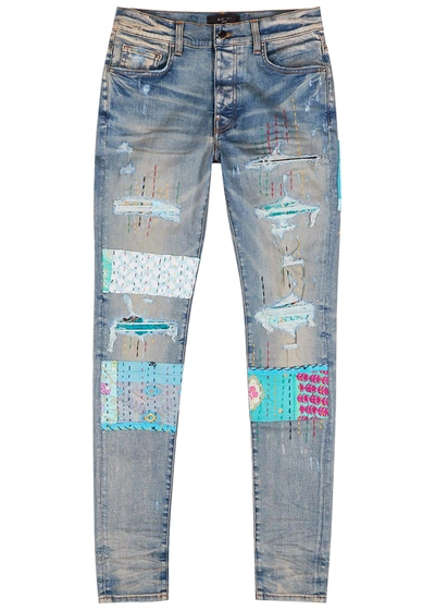Amiri Art Patch Appliquéd Skinny Jeans In Denim