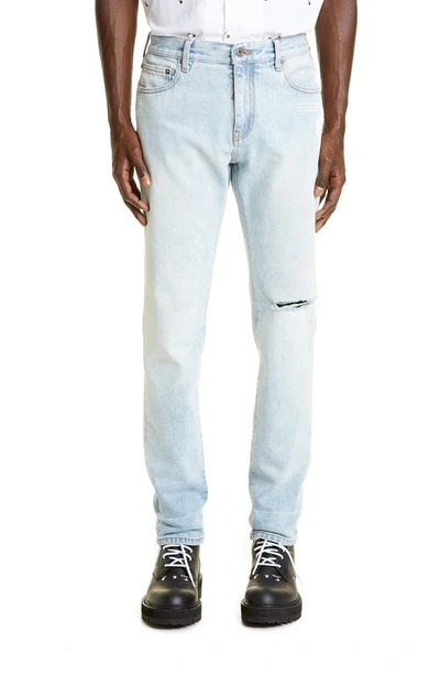 Off-white Distressed Skinny Jeans In Bleach Blue