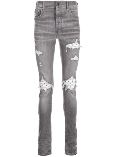 Amiri Playboy Ribbed Leather Panel Ripped Washed Jeans In Grey