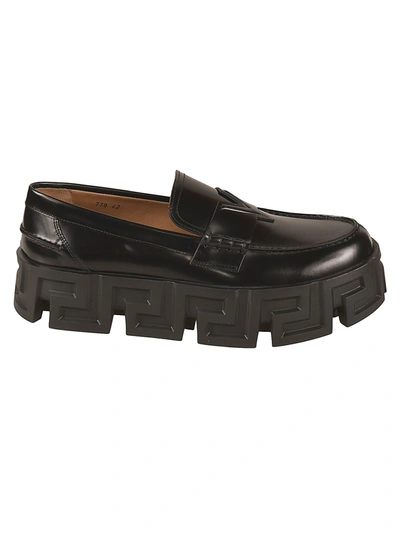 Versace Logo Embossed Sole Loafers In Black