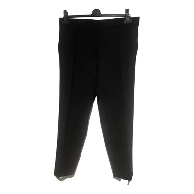 Pre-owned Iro Wool Trousers In Black