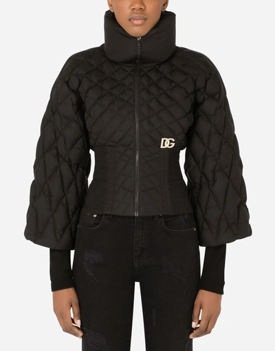 Dolce & Gabbana Quilted Nylon Jacket With Knit Sleeves And Crystal Dg Embellishment In Black
