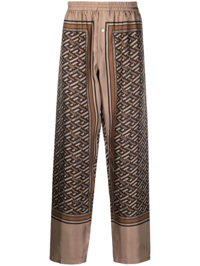 Versace Geometric-print Straight Trousers In Braun