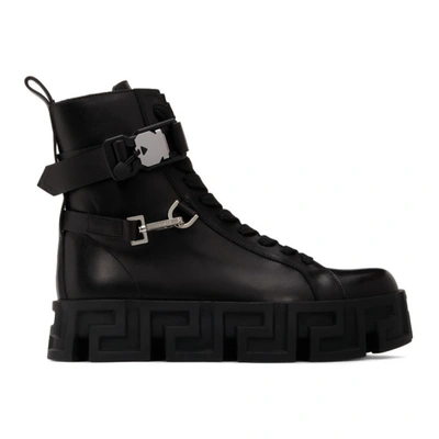 Versace Greca-sole Ankle Boots In Black