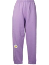 Natasha Zinko Daisy-print Cropped Track Pants In Purple